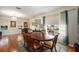 Open-concept space showing the living room, dining room and views to the front yard and outside at 709 Grand Canyon Dr, Valrico, FL 33594