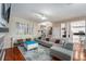 Bright living room with a large sectional and neutral decor at 709 Grand Canyon Dr, Valrico, FL 33594