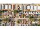 Wide aerial view of a neighborhood with many well kept houses at 7318 Bellows Falls Ln, Hudson, FL 34667