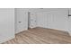 Bedroom featuring multiple closets and neutral colors at 7318 Bellows Falls Ln, Hudson, FL 34667
