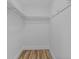 Walk-in closet featuring clothing rods and shelving at 7318 Bellows Falls Ln, Hudson, FL 34667