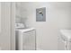 Well-equipped laundry room featuring a modern washing machine and dryer for convenience at 800 S Dakota Ave # 204, Tampa, FL 33606