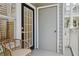 Inviting outdoor patio featuring comfortable seating, privacy door, and natural light at 800 S Dakota Ave # 204, Tampa, FL 33606