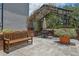 Charming patio area with comfortable seating under a vine-covered pergola, perfect for relaxation at 800 S Dakota Ave # 204, Tampa, FL 33606