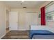 Bedroom featuring wood floors, closet and natural light from one window at 920 York Dr, Brandon, FL 33510