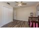 Bedroom featuring wood floors, closet and natural light from one window at 920 York Dr, Brandon, FL 33510