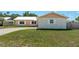 Charming one story home with a manicured lawn and a concrete driveway at 920 York Dr, Brandon, FL 33510