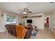 Comfortable living room with ample natural light, stylish decor, and a view of the backyard at 920 York Dr, Brandon, FL 33510