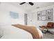 Another view of the bedroom with sleek furniture and a modern interior design at 9485 Treasure Ne Ln, St Petersburg, FL 33702
