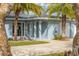 Home exterior with well-maintained landscaping and inviting curb appeal at 9485 Treasure Ne Ln, St Petersburg, FL 33702