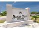 Yacht Club Estates community sign surrounded by manicured landscaping at 9591 Commodore Dr, Seminole, FL 33776