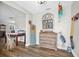 Inviting entryway with wood-look tile flooring and decorative accents at 9591 Commodore Dr, Seminole, FL 33776