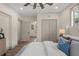 Bedroom featuring a neutral color palette, with lots of closet space at 100 E Fern St, Tampa, FL 33604