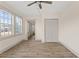 Empty bedroom with hardwood floors, ample natural light, and closet at 100 E Fern St, Tampa, FL 33604
