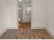 Entryway with laminate flooring and a view of the front door at 100 E Fern St, Tampa, FL 33604