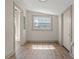 Hallway featuring natural light and neutral-colored walls at 100 E Fern St, Tampa, FL 33604