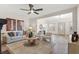 Bright living room featuring neutral tones, stylish decor, and plenty of natural light at 100 E Fern St, Tampa, FL 33604