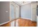 Dining area with hardwood floors and French doors offering plenty of natural light at 102 S Moody Ave # 1, Tampa, FL 33609