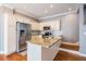 Well-equipped kitchen featuring granite counters, stainless appliances, and ample cabinet space at 102 S Moody Ave # 1, Tampa, FL 33609