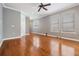 Spacious living room featuring hardwood floors, neutral paint, and lots of natural light at 102 S Moody Ave # 1, Tampa, FL 33609