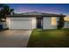 Charming single-Gathering home boasting a well-manicured lawn and solar panels for energy efficiency at 11123 Thornberry Dr, Spring Hill, FL 34609