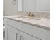 Bathroom vanity with white cabinets, light countertop, and stainless steel hardware at 11354 Callisia Dr, Odessa, FL 33556