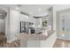 Bright kitchen with white cabinetry, modern appliances, and lots of countertop space at 11354 Callisia Dr, Odessa, FL 33556
