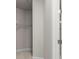 Spacious walk-in closet with metal hanging racks and shelving, providing organized storage space at 11354 Callisia Dr, Odessa, FL 33556