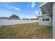 Expansive backyard with a privacy fence, offering ample space for outdoor activities and relaxation at 11720 80Th Ave, Seminole, FL 33772