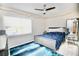 Cozy bedroom with nice ceiling fan at 11821 Easthampton Dr, Tampa, FL 33626