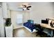 Small bedroom featuring a desk and a twin sized bed at 11821 Easthampton Dr, Tampa, FL 33626