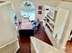 Bright, open living room with high ceilings, hardwood floors, and direct access to a screened pool at 11821 Easthampton Dr, Tampa, FL 33626