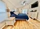 Spacious main bedroom with a ceiling fan, and wood-look flooring for a cozy retreat at 11821 Easthampton Dr, Tampa, FL 33626