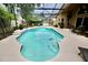 Inviting screened-in pool with a patio and lounge chairs perfect for relaxation and entertaining at 11821 Easthampton Dr, Tampa, FL 33626