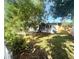 Backyard view with a well-maintained lawn and partial fencing at 1200 47Th St N, St Petersburg, FL 33713