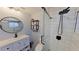 Modern bathroom with a glass-enclosed shower, white subway tile, and a stylish vanity at 1200 47Th St N, St Petersburg, FL 33713