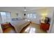 Serene bedroom with natural light, a ceiling fan, and hardwood floors at 1200 47Th St N, St Petersburg, FL 33713