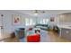 Cozy living room with ample natural light, stylish furnishings, and a comfortable seating arrangement at 1200 47Th St N, St Petersburg, FL 33713