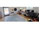 Spacious home office featuring hardwood floors, modern decor, and a comfortable work environment at 1200 47Th St N, St Petersburg, FL 33713
