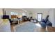Well-lit home office with modern decor, hardwood floors, and ample workspace at 1200 47Th St N, St Petersburg, FL 33713