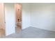Bright bedroom leading to ensuite bathroom at 1218 E Kay St # 21, Tampa, FL 33602