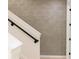 Staircase with black metal railing and white trim at 1218 E Kay St # 21, Tampa, FL 33602