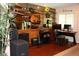 Unique bonus room features a wall of guitars, creating a music-themed space at 12929 Sugar Creek Blvd, Hudson, FL 34669