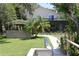 Exterior view of the home from the backyard at 12929 Sugar Creek Blvd, Hudson, FL 34669