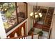 Grand foyer with a chandelier and staircase at 12929 Sugar Creek Blvd, Hudson, FL 34669
