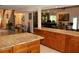 Open-concept kitchen with an island view to bonus room, stairs and living room at 12929 Sugar Creek Blvd, Hudson, FL 34669