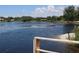 Tranquil lake view, enhancing the property's appeal at 12929 Sugar Creek Blvd, Hudson, FL 34669