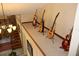 Unique loft area with multiple guitars on display, overlooking staircase at 12929 Sugar Creek Blvd, Hudson, FL 34669