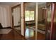 Mirrored closets give view to this main bedroom with it's sitting area and fireplace at 12929 Sugar Creek Blvd, Hudson, FL 34669