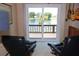 Scenic view from the music room, featuring a tranquil lake and private dock at 12929 Sugar Creek Blvd, Hudson, FL 34669